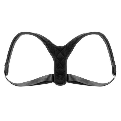 Posture corrector back brace worn over a t-shirt