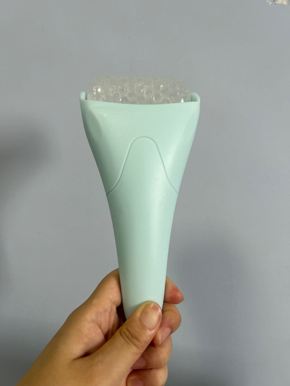 Facial ice roller, light blue