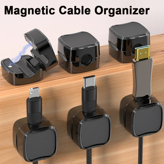 Magnetic cable clips holding a phone charging cord