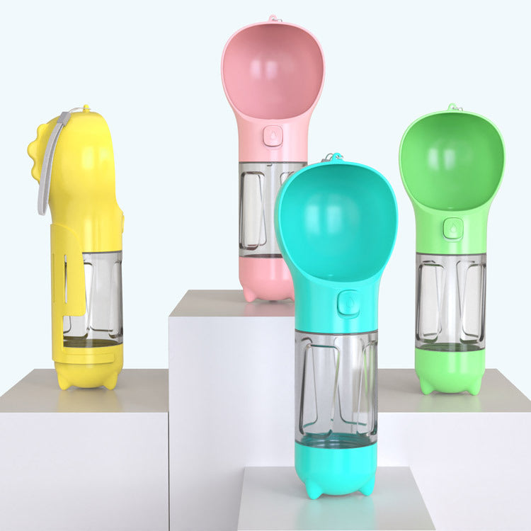 Portable pet water bottle clipped to a leash