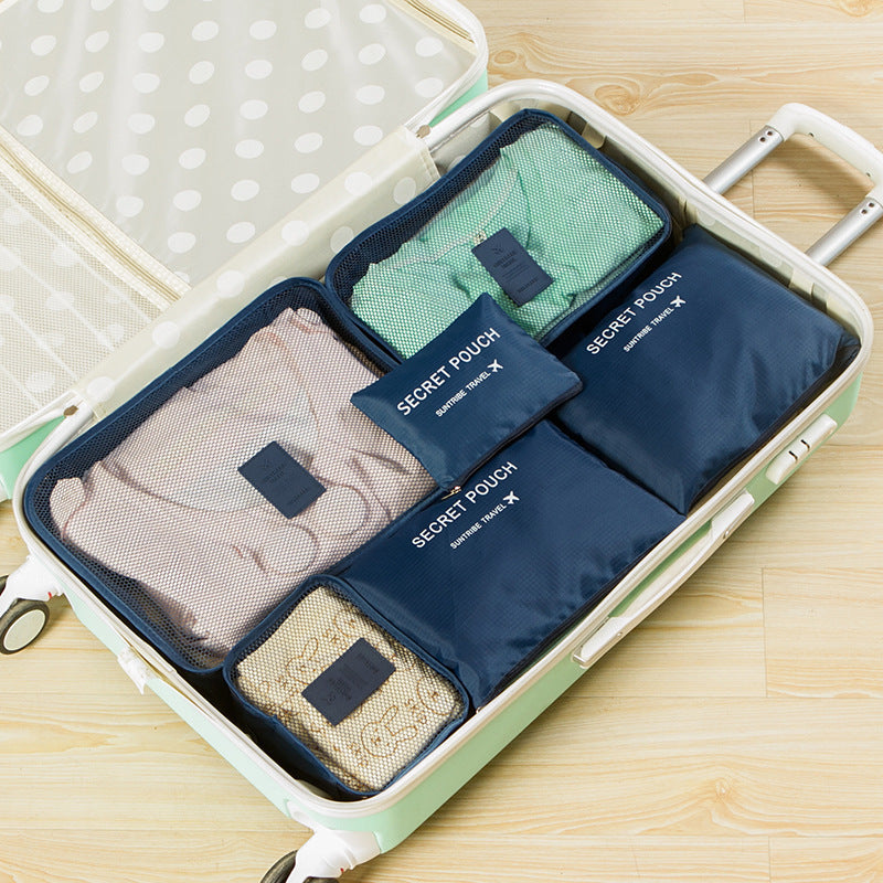 Compression packing cubes packed inside a suitcase