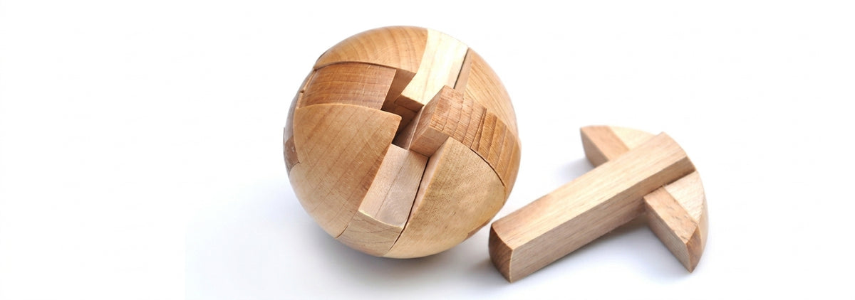 Wooden magic ball puzzle — party favors hero banner