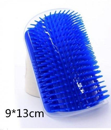 Cat self-grooming wall brush in use with a kitten